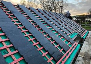 re-roofing project by the team